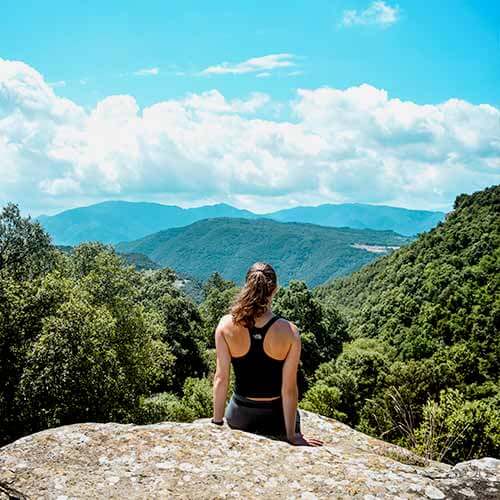 Student overlooking the valley at Rupit