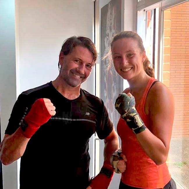 Charles and Danielle posing with boxing gloves on