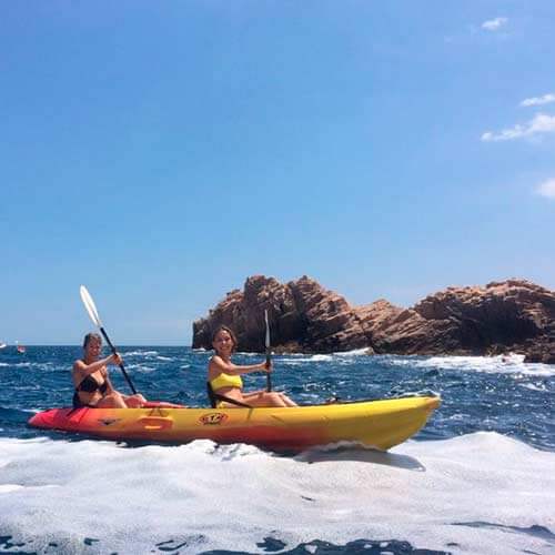 Students kayaking in summer