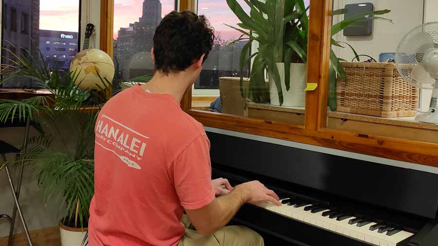 Student playing te piano