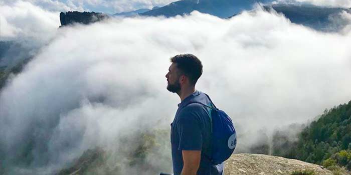 Student overlooking the valley of Rupit