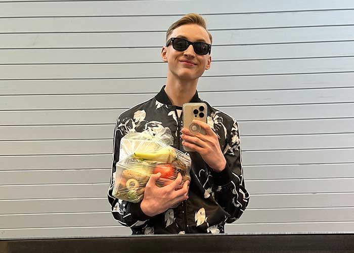 Aidan with groceries